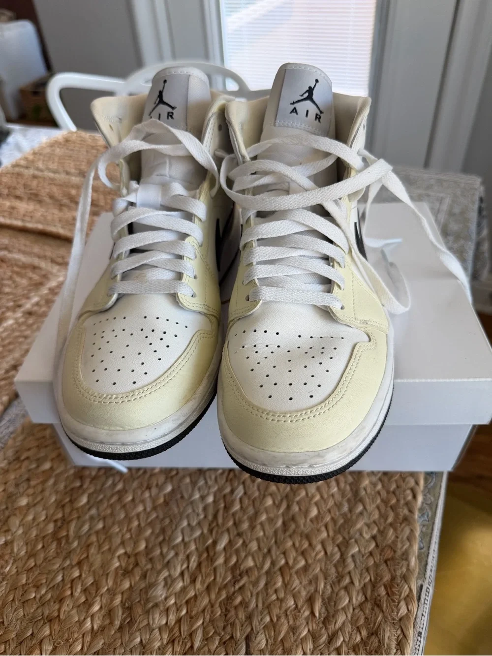Jordan 1 Mid Coconut Milk with Black Swoosh
